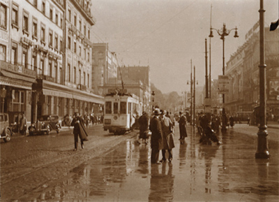 Leonard Misonne - Rainy Street with Tram in Brussels, Belgium