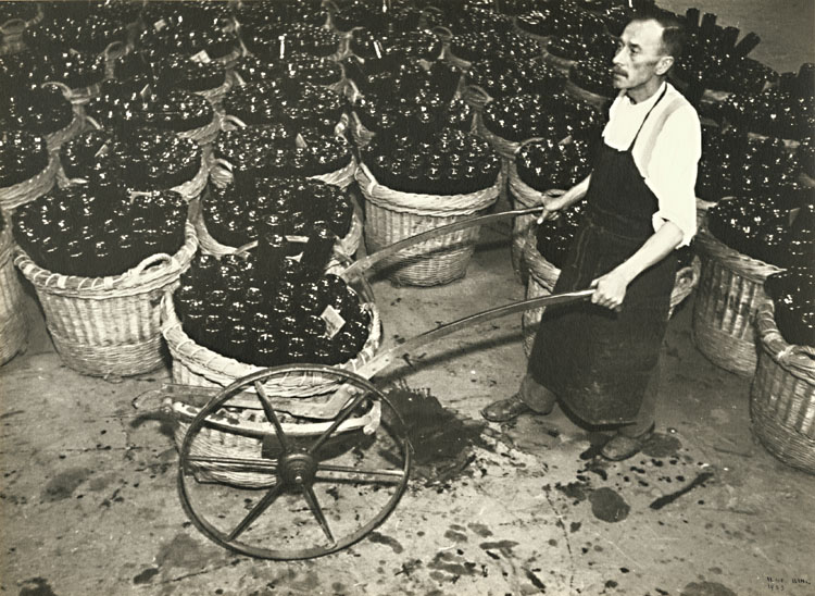 Ilse Bing - Man Wheeling Baskets of Champagne Bottles Ilse Bing - Man Wheeling Baskets of Champagne Bottles